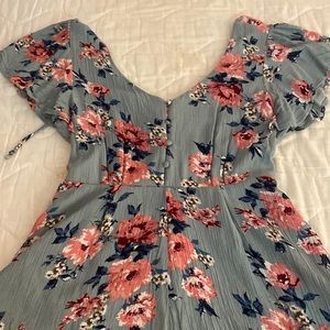 Francesca’s Short Floral Romper with front buttons